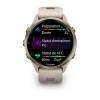 Montre Forerunner 970 Garmin - 47 mm - Lunette titane Soft Gold, boîtier lin, bracelet lin/violet translucide